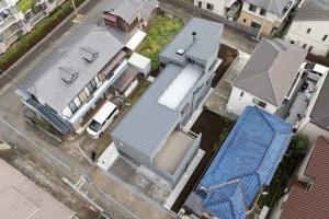 クランクした敷地を活かした家［平屋のように暮らせる趣味豊かな家］